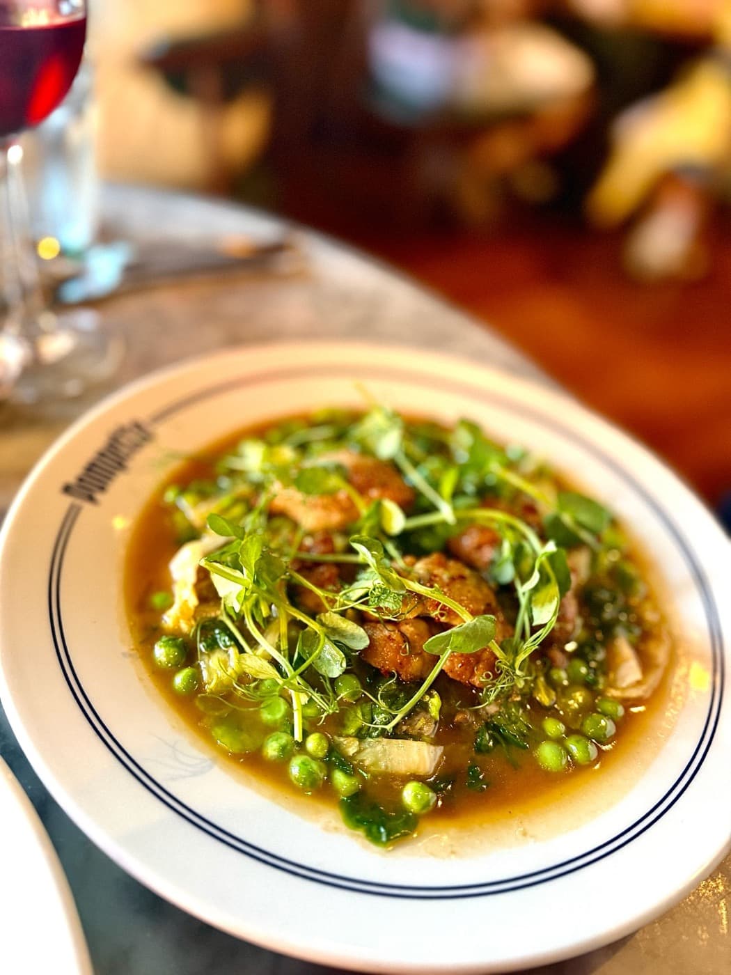 Sautéed lamb sweetbreads with peas, broad beans and gem lettuce