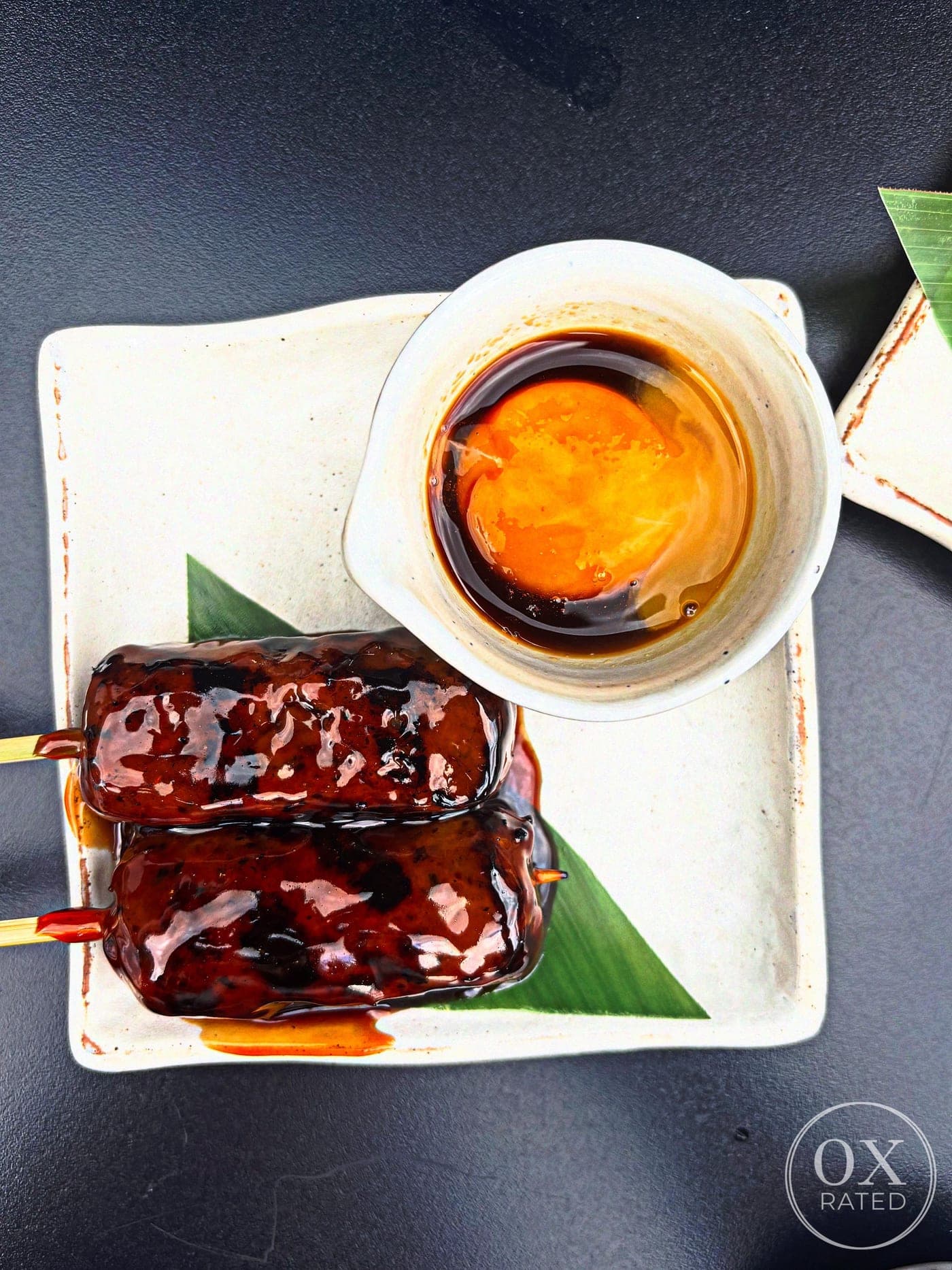 Yakitori skewers with dipping sauce at Sticks'n'Sushi Oxford